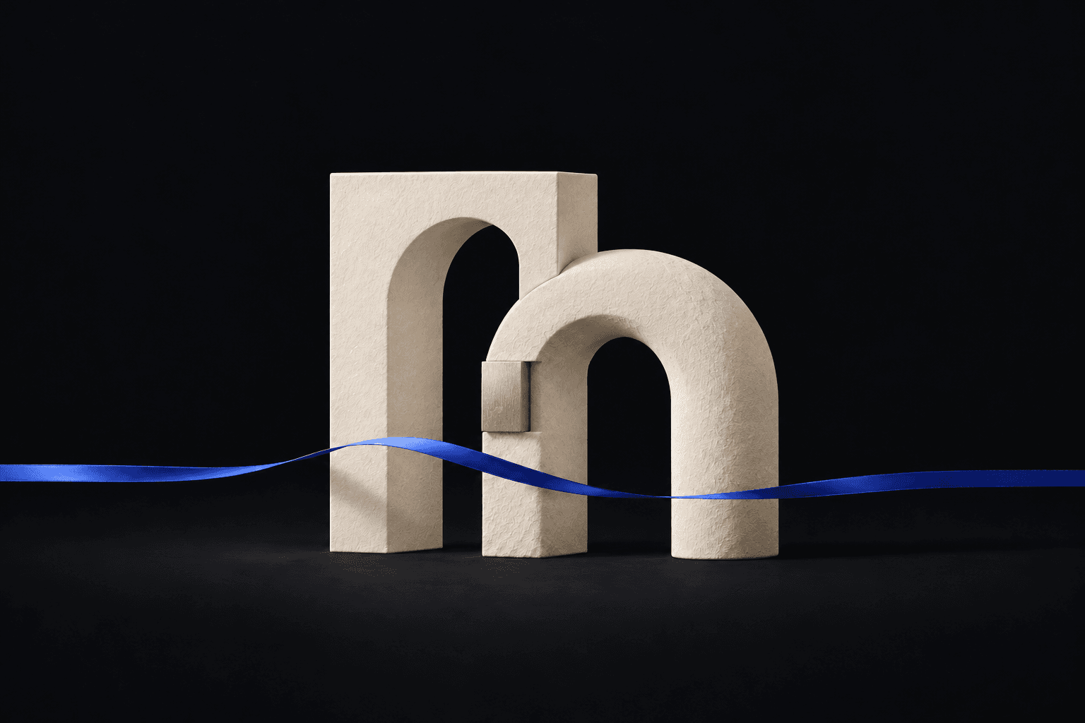 Two complementary ivory arches joined by a silver accent, with a cobalt ribbon crossing a charcoal background.