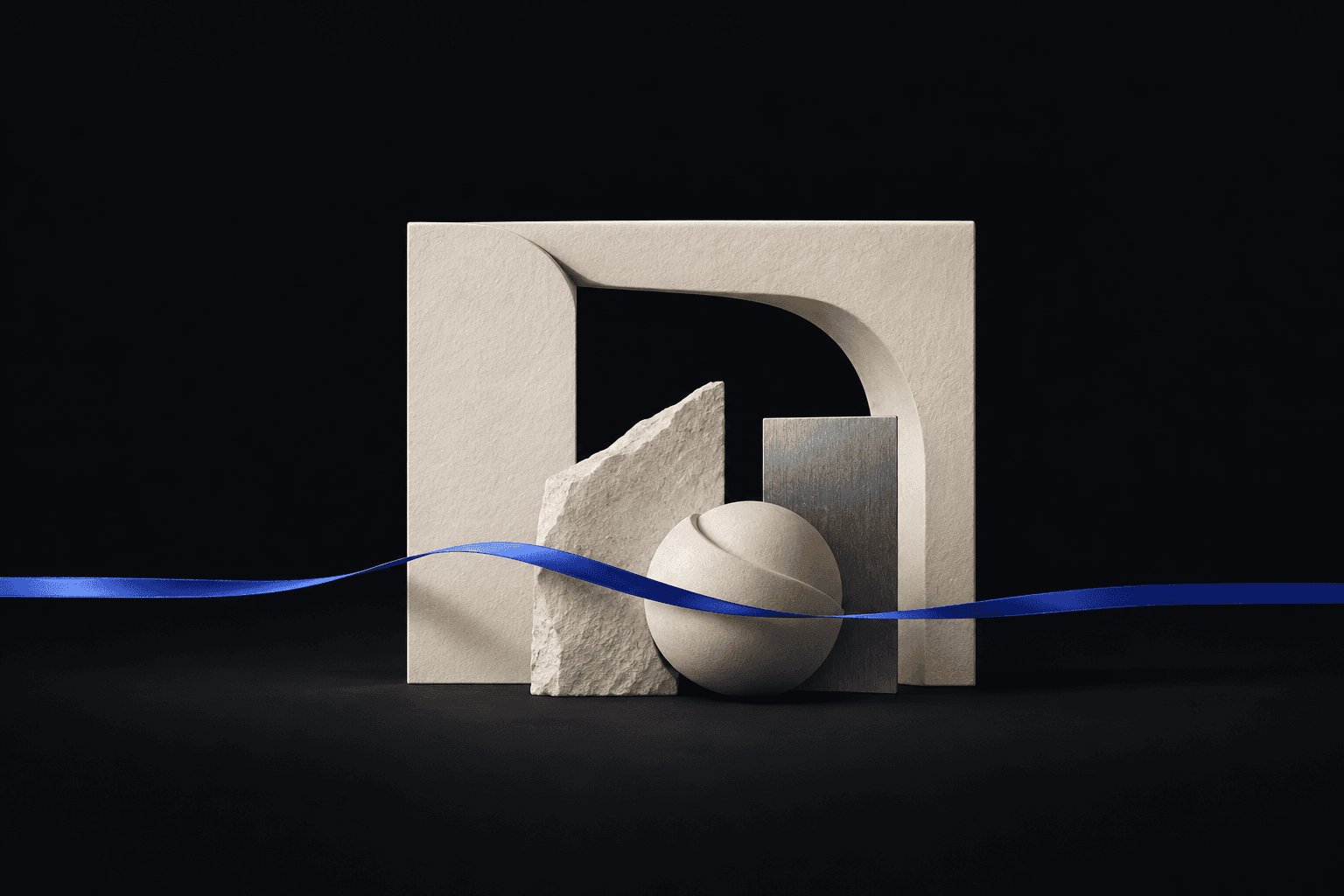 An ivory frame, textured stone, silver plane and sphere crossed by a cobalt ribbon on charcoal.